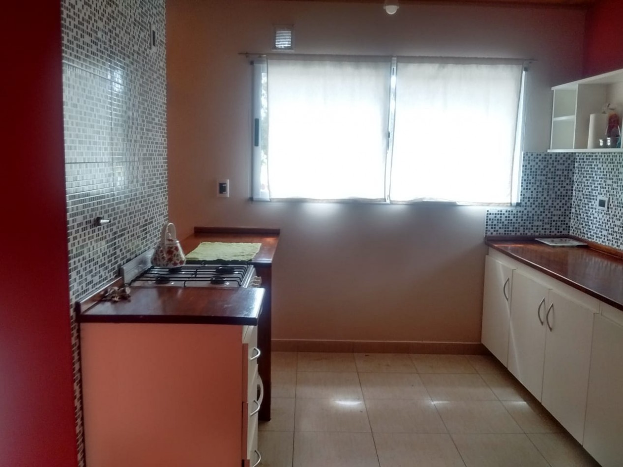 Casa frente al golf de Villa Gesell ( con dos departamentos )