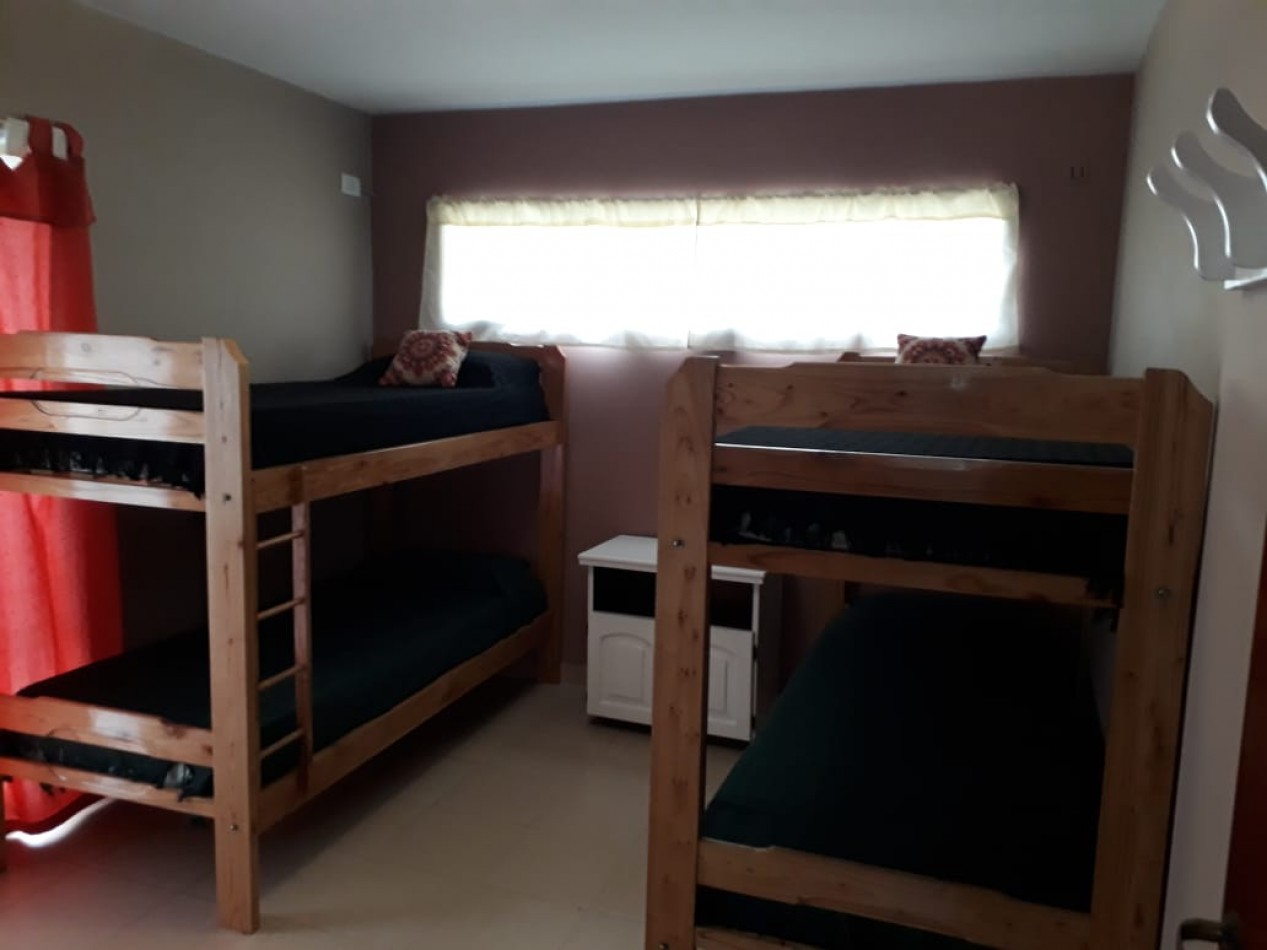 Casa frente al golf de Villa Gesell ( con dos departamentos )